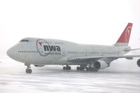 N673US @ CID - NWA9840  taxiing to the cargo ramp.  Seen from my 2nd floor office window - by Glenn E. Chatfield