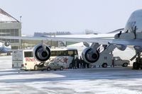 N673US @ CID - First bus unloading members of the U of I football team - by Glenn E. Chatfield