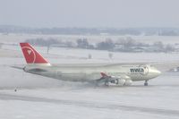 N673US @ CID - NWA9980 at Runway 27. Wind 280@25-30 kt and I'm outside on the tower catwalk - by Glenn E. Chatfield