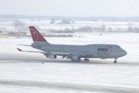 N673US @ CID - NWA9980 Runway 27 take-off roll. Wind 280@25-30 kt and I'm outside on the tower catwalk - by Glenn E. Chatfield