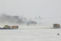 N241FE @ CID - Landing Runway 27 in the snow. - by Glenn E. Chatfield