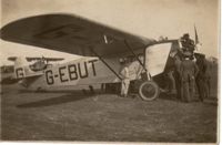 G-EBUT - Unknown location aircraft and crew? biplane in background - by Briggs Bradford