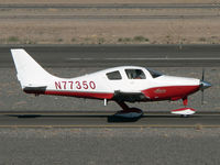 N77350 @ KDVT - Taxiing past the terminal - by John Meneely