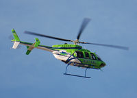 N374AL - AirLife Denver heading NE over Columbine High School. - by Bluedharma