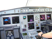 D-ALPJ @ EDDL - Vision of the office of this very new aircraft. The first officer was going to conduct the flight and was still setting the route (and/or other technical data) in the FMS (FMDG). - by Philippe Bleus