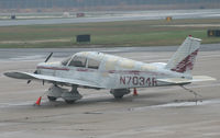 N7034R @ KWWD - A venerable 1966 Cherokee patiently awaits her next respray. - by Daniel L. Berek