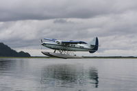 N87AW - Landing Big River Lakes AK - by Gary Kegel