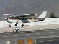N7526G @ CCB - Almost down passing retired Security Vehicle - by Helicopterfriend