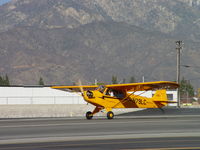 N79LC @ CCB - Tail wheel up and rolling westbound - by Helicopterfriend