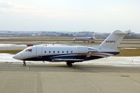 N336FX @ CID - Taxiing to Runway 27 for departure. - by Glenn E. Chatfield