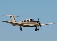 N8250V @ DTN - Landing at Downtown Shreveport. Notice I am getting my picture taken by the backseater. - by paulp
