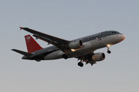 N349NB @ KLAX - Landing 24R at LAX, taken well after sunset. - by Todd Royer