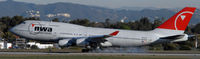 N674US @ KLAX - Landing 24R at LAX - by Todd Royer