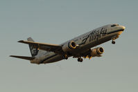 N705AS @ KLAX - Landing 24R at LAX - by Todd Royer
