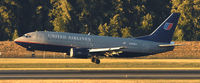 N309UA @ KPDX - Landing 28R at PDX - by Todd Royer