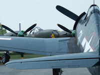 N4994V @ KMWO - On display with Porky II, a P38J (N138AM) - by Allen M. Schultheiss