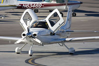 N718SR @ VGT - 2006 Cirrus SR22 N718SR at the fuel pit.
