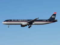 N163US @ PHX - Short final for 25R - by John Meneely