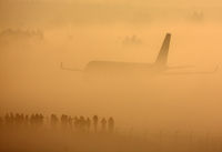 RA-64043 @ LOWS - Early morning impression with many spotters waiting for a sunny day.