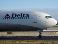 N199DN @ EGCC - Taxing out on a snowy morning - by David W