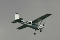 C-FKHL - Seen over Stump Pass FL - by John Asher