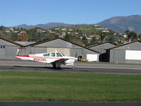 N5828S @ SZP - 1964 Beech S35 BONANZA, Continental IO-520-B 285 Hp, landing roll rwy 04 - by Doug Robertson