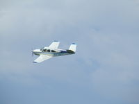 N9795Y @ K81 - Nice V-tail at Miami Co airport days