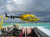 N410PH - Sitting on helideck in the Gulf of Mexico - by thefossilmedic