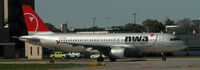 N327NW @ KMSP - Taxi for departure - by Todd Royer