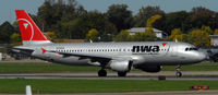 N328NW @ KMSP - Departing MSP on 12L - by Todd Royer