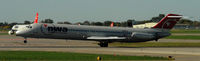 N401EA @ KMSP - Landing Runway 22 at MSP - by Todd Royer