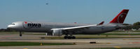 N810NW @ KMSP - Landing Runway 22 at MSP - by Todd Royer