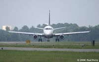 N122HQ @ ORF - Looks quite compact, doesn't she? - by Paul Perry