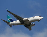 C-GMWJ @ MCO - West Jet 737-700 - by Florida Metal