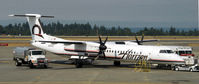 N424QX @ KSEA - Preparing for departure - by Todd Royer