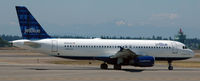 N599JB @ KSEA - Taxi for departure - by Todd Royer