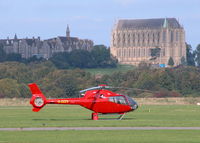 G-ZZZS @ EGKA - EC120 WITH LANCING COLLEGE IN THE BACK GROUND - by BIKE PILOT