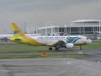 RP-C3240 @ RPLL - Small 'Bus' taxing at Manila - by John J. Boling