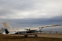 N75918 @ 52F - Parked near the fuel pumps - by James K. Adamson