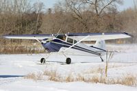 N170GA @ 6MN9 - Arriving at Benson's Airport on skis - by Timothy Aanerud