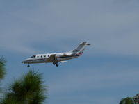 N147QS @ KPIE - Landing @ KPIE - by Mike Schwab