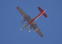 N443NA - Flying East over Columbine High School. My source tells me the 2 jet engines on the outboard pylon are used to get airborne when the temperature is high.