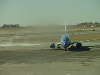 N346SW @ MCI - Blowing snow while moving up to Gateway - by Helicopterfriend