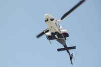 N419MA - Passing overhead for landing at Canine Demo at Chaffey College - by Helicopterfriend
