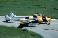 J-1111 @ LSMS - The pilot tries to wave from his cramped cockpit. Some succes...