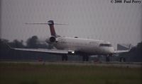 N689CA @ ORF - Comair flight during one of the very dark overcast times