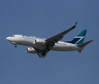 C-FWBL @ MCO - West Jet 737-700 - by Florida Metal