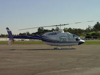 N788BD @ POC - Tied down and waiting, northside of Brackett - by Helicopterfriend