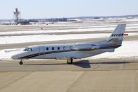 N841DW @ CID - Taxiing by my window on the way to Runway 27 - by Glenn E. Chatfield