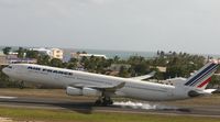 F-GLZO @ TNCM - touch down runway 10 - by daniel jef